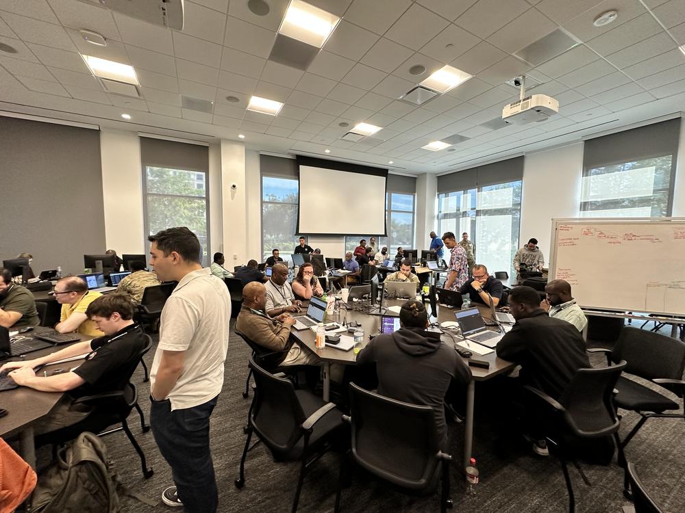 Cyber Dawg event participants working