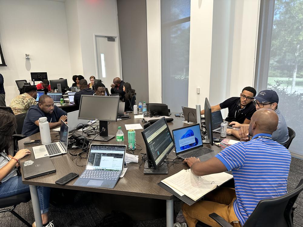 Cyber Dawg event participants working